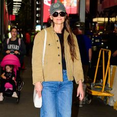 Katie Holmes wears burgundy boots.