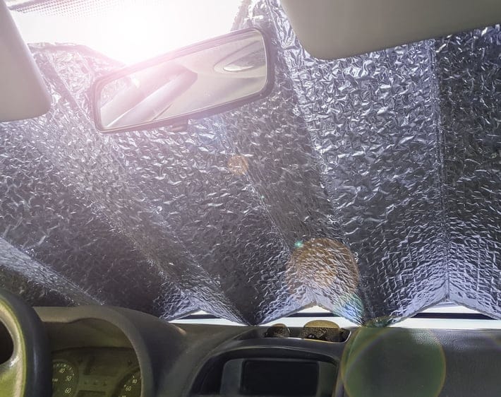 Heat shield on car windshield